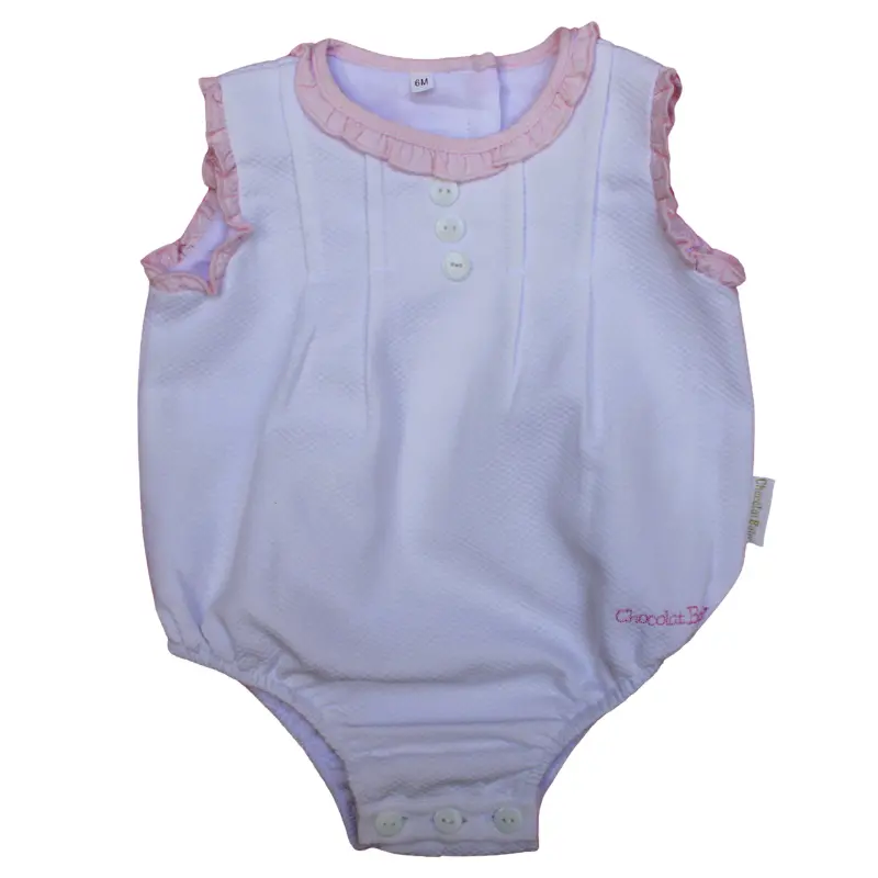 Enterizo plisado de color blanco con volantes rosas para bebé de Chocolat Baby